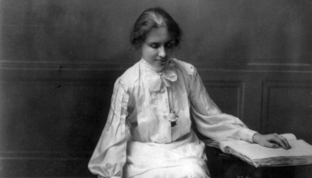 Hellen Keller reading brail