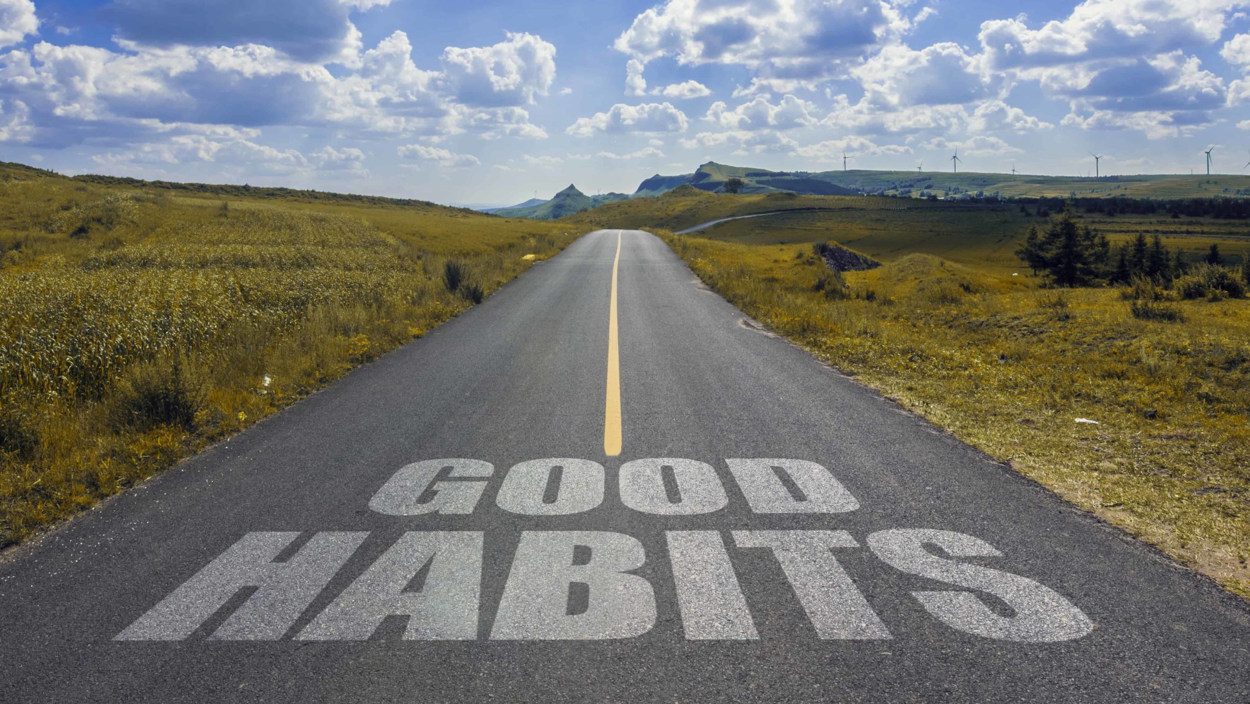 Road with "Good habits" painted on it